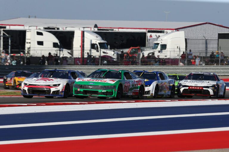 NASCAR Cup Series driver Ty Dillon (10) and NASCAR Cup Series driver Ryan Preece (60) enter turn 16 during the NASCAR Cup Series Duramax Texas Grand Prix Powered by RelaDyne at Circuit of the Americas.