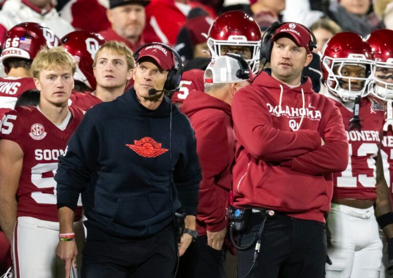 Oklahoma Sooners head coach Brent Venables (left) and inside linebackers coach Nate Dreiling against the Alabama Crimson Tide during the CFP National Playoff First Round at Gaylord Family Oklahoma Memorial Stadium.