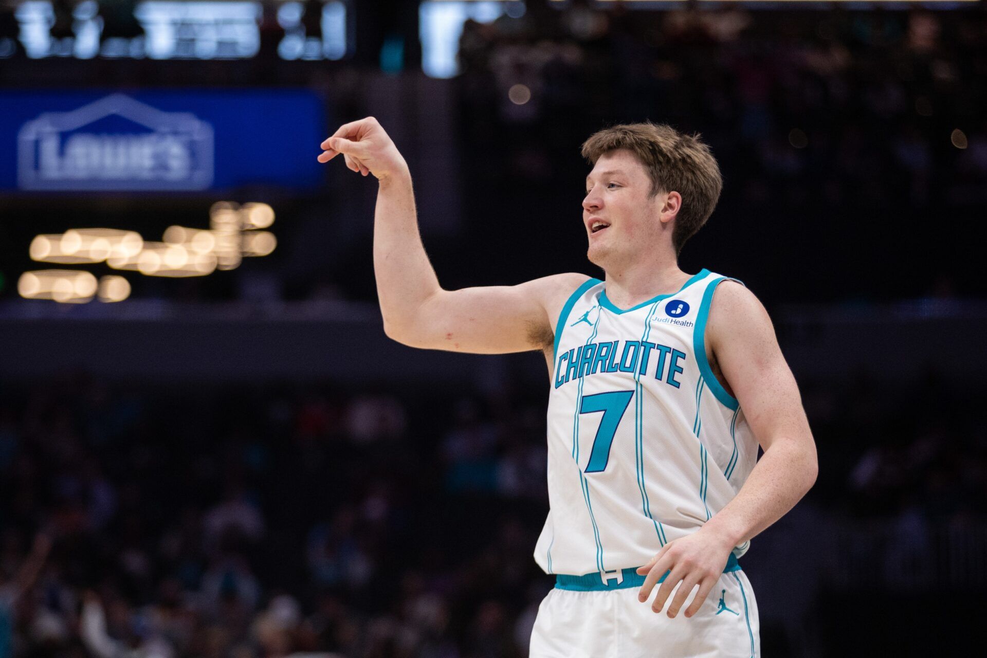 Charlotte Hornets guard Kon Knueppel (7) celebrates a three point basket against the Portland Trail Blazers during the first quarter at Spectrum Center.