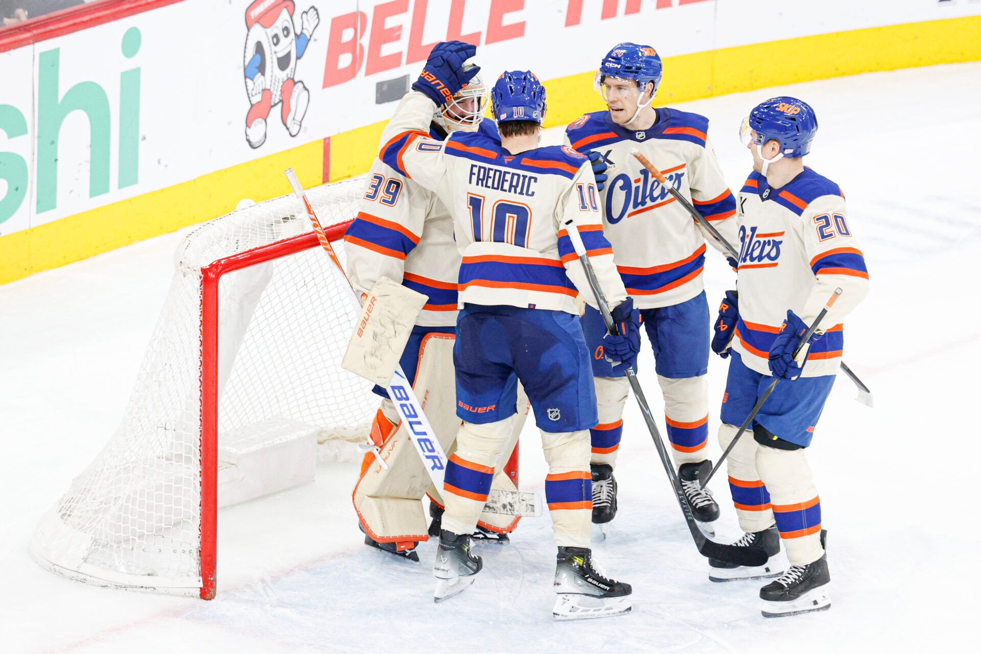 Edmonton Oilers players celebrate at United Center.