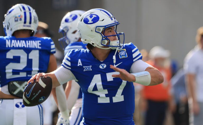 BYU Cougars quarterback Bear Bachmeier (47) works out prior to the game against the Georgia Tech Yellow Jackets at Camping World Stadium.