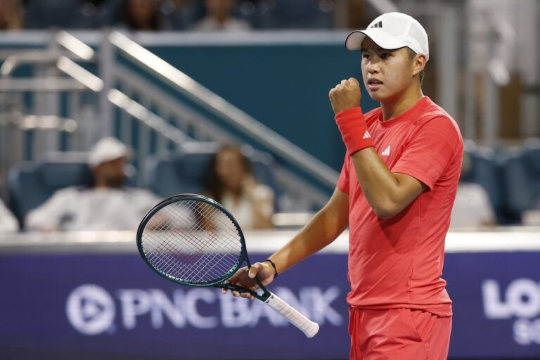 Learner Tien (USA) reacts after winning the first set tie-breaker against Joao Fonseca (BRA)(not pictured) on day three of the Miami Open at Hard Rock Stadium.