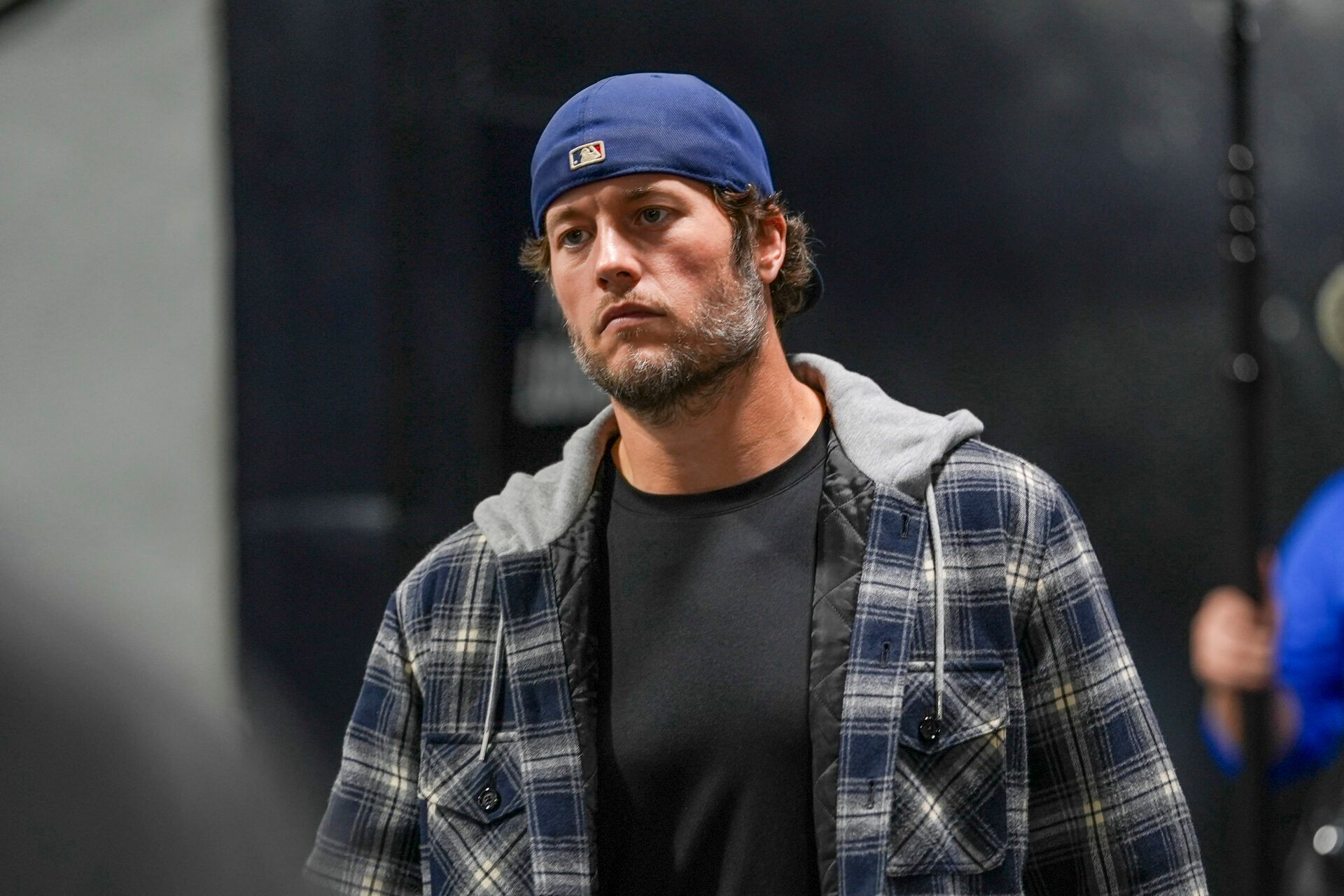 Los Angeles Rams quarterback Matthew Stafford (9) walks into the stadium before the NFC Wild Card Round game against the Carolina Panthers at Bank of America Stadium.
