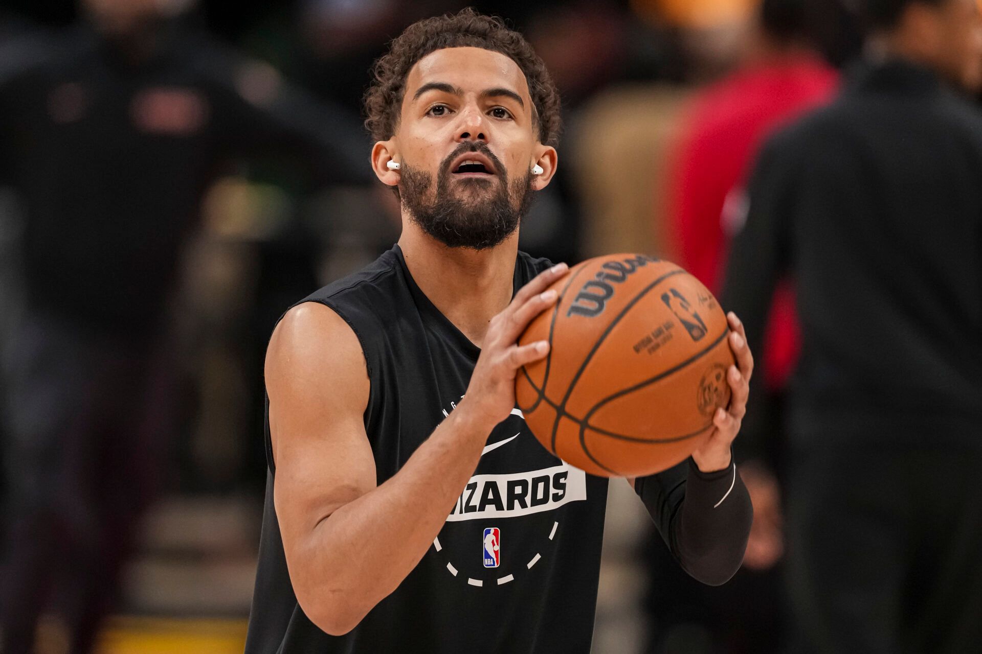 Washington Wizards guard Trae Young (3) warms up on the court before the game against the Atlanta Hawks at State Farm Arena.