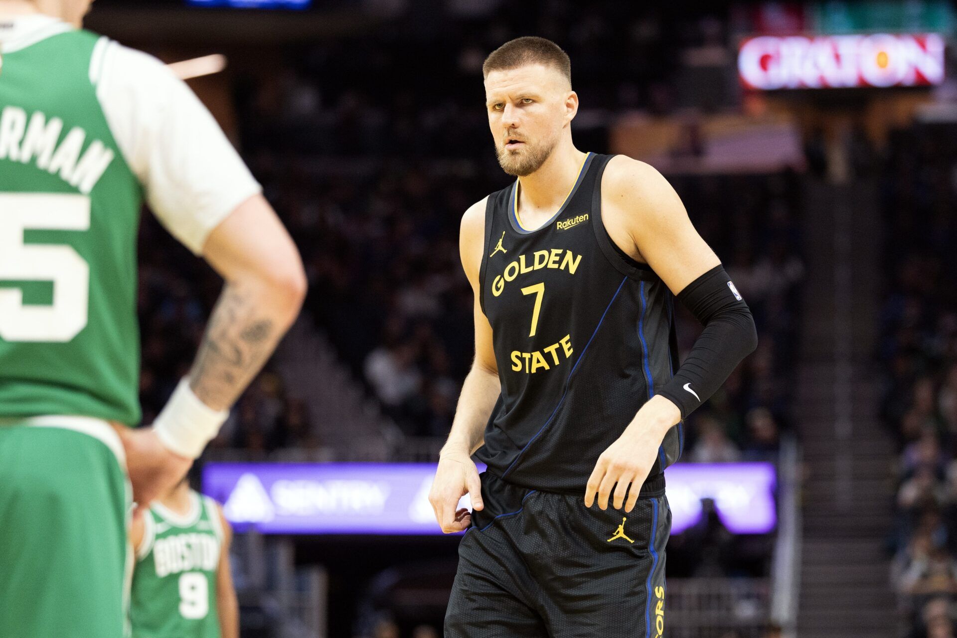 Golden State Warriors center Kristaps Porziņġis (7) comes in as a substitute against the Boston Celtics during the second quarter at Chase Center.