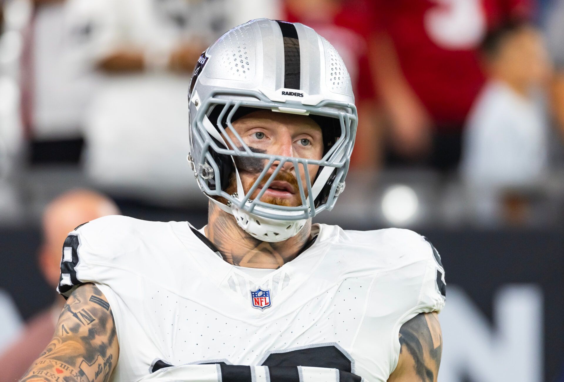 Las Vegas Raiders defensive end Maxx Crosby (98) against the Arizona Cardinals during a preseason NFL game at State Farm Stadium.