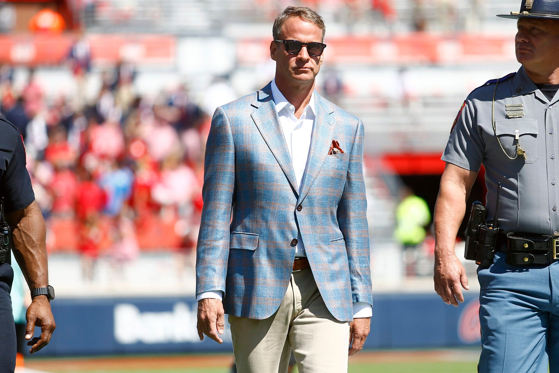 Mississippi Rebels head coach Lane Kiffin walks across the field at Vaught-Hemingway Stadium prior to the game against the LSU Tigers.