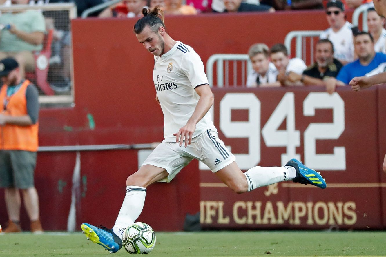 Real Madrid forward Gareth Bale (11) passes the ball against Juventus during an International Champions Cup soccer match at FedEx Field.