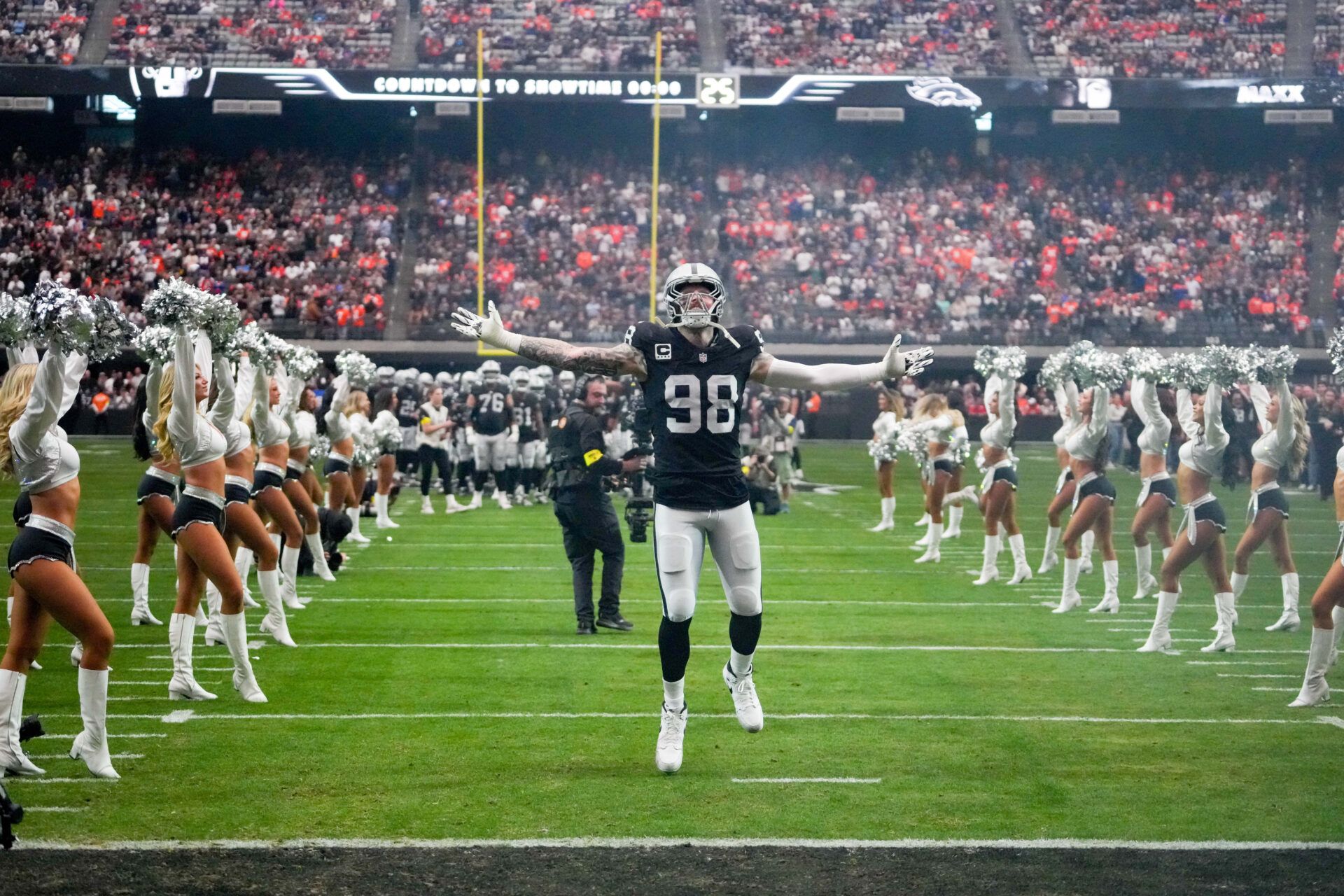Las Vegas Raiders defensive end Maxx Crosby (98) takes the field prior to a game against the Denver Broncos at Allegiant Stadium.