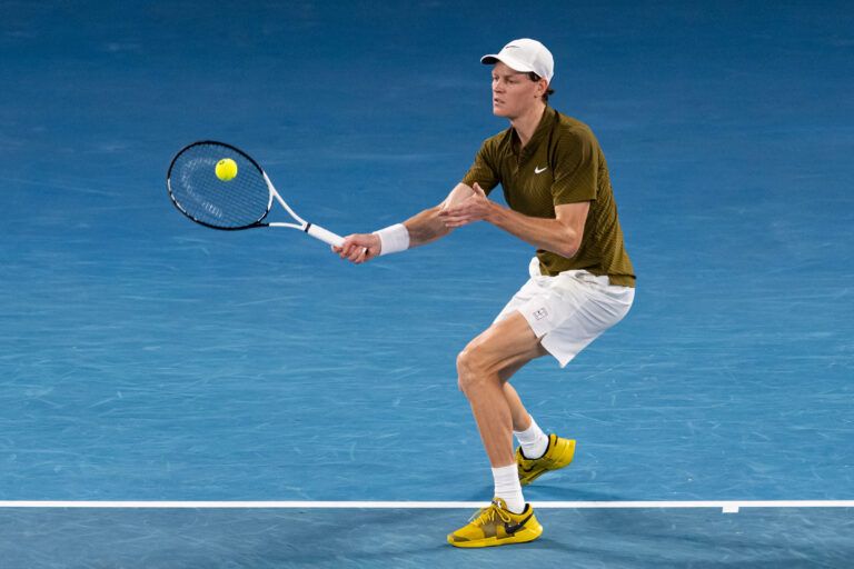 Jannik Sinner of Italy in action against Novak Djokovic of Serbia in the semifinals of the mens singles at the Australian Open at Rod Laver Arena in Melbourne Park.