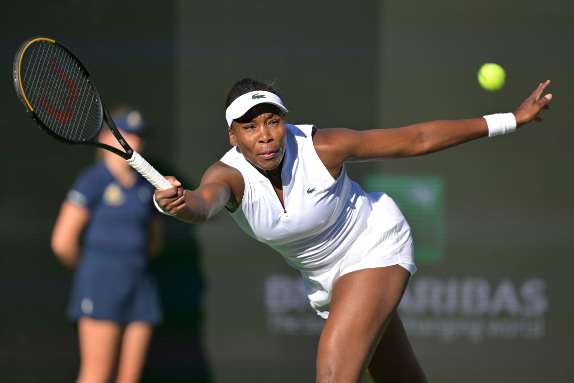 Venus Williams (USA) hits a shot during her first round match against Diane Parry (FRA) during the BNP Paribas Open at the Indian Wells Tennis Garden.