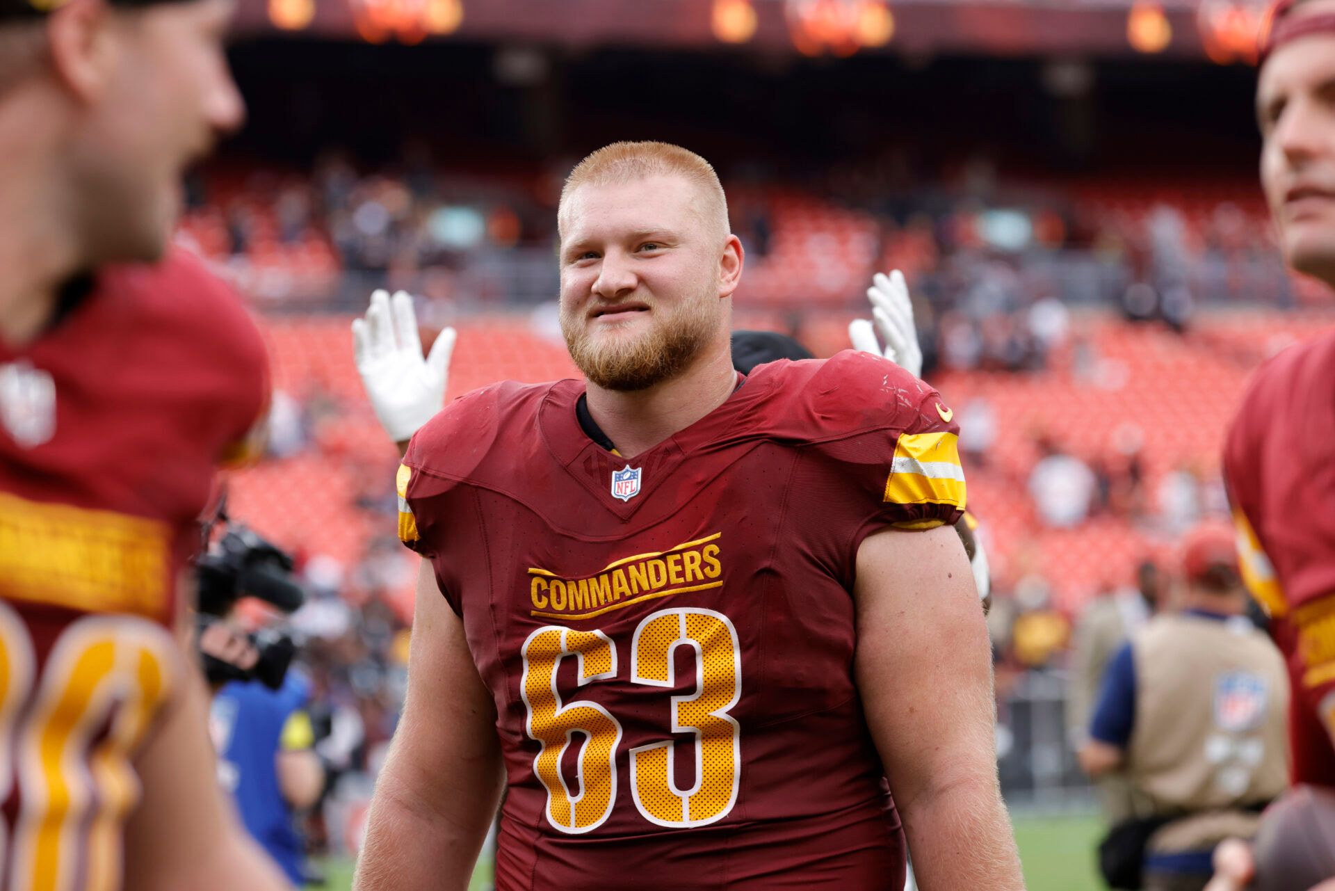 Washington Commanders center Tyler Biadasz (63) walks off the field after the game against the Las Vegas Raiders at Northwest Stadium.