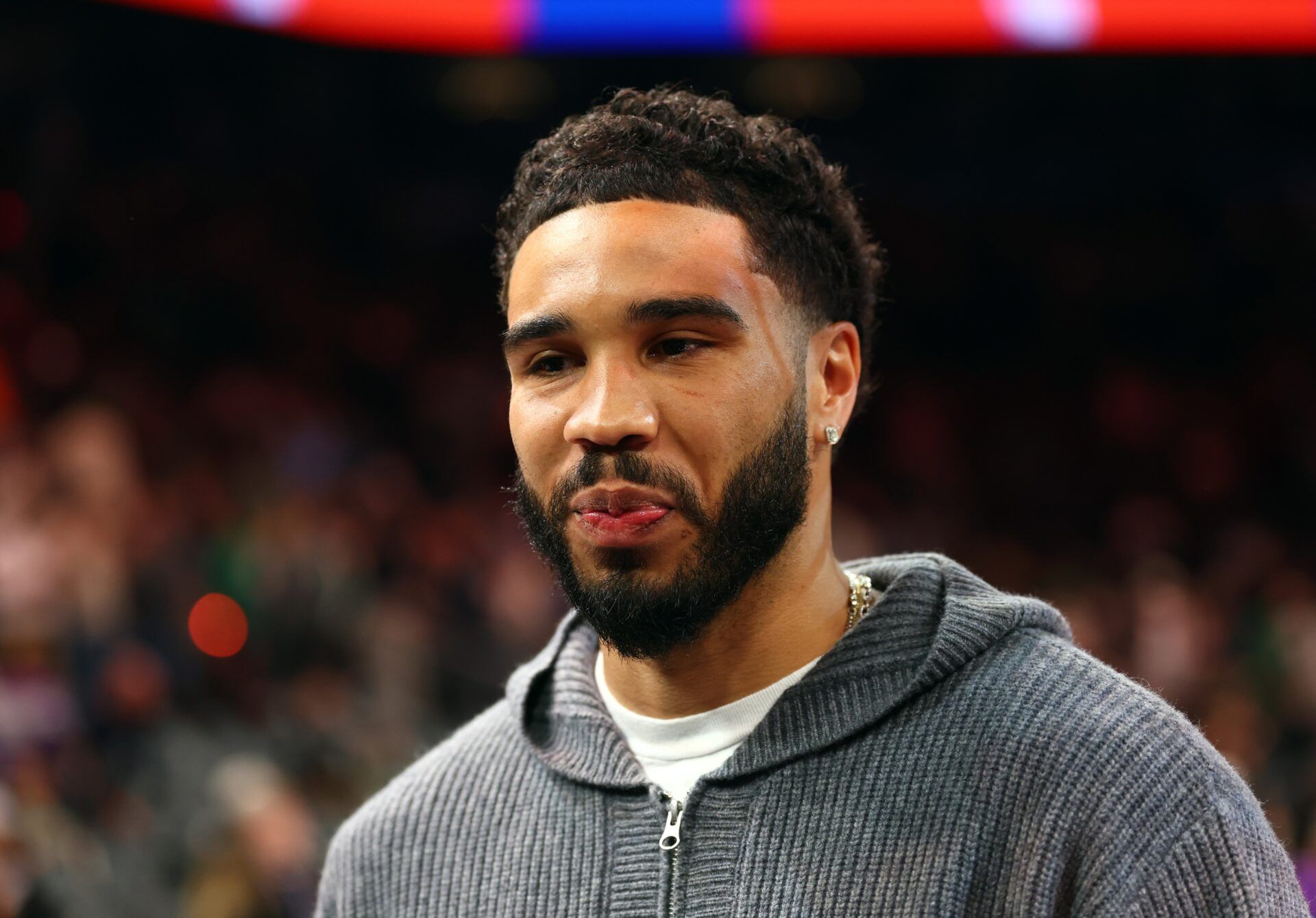 Boston Celtics injured forward Jayson Tatum against the Phoenix Suns in the first half at Mortgage Matchup Center.