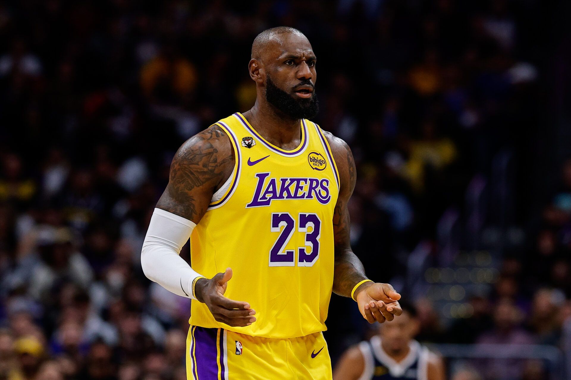 Los Angeles Lakers forward LeBron James (23) reacts after a play in the first quarter against the Denver Nuggets at Ball Arena.