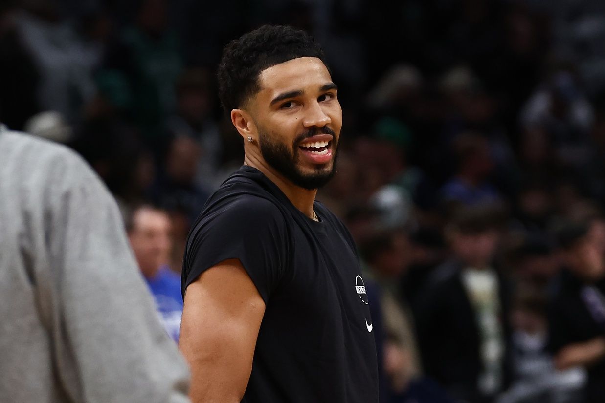 Boston Celtics forward Jayson Tatum (0) smiles before their game against the Dallas Mavericks at TD Garden.