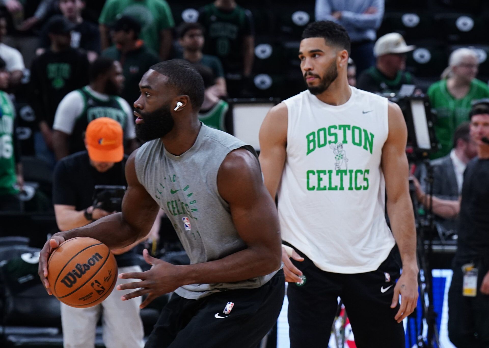 Boston Celtics guard Jaylen Brown (7) and forward Jayson Tatum (0) warm up before game five of first round for the 2025 NBA Playoffs against the Orlando Magic at TD Garden.