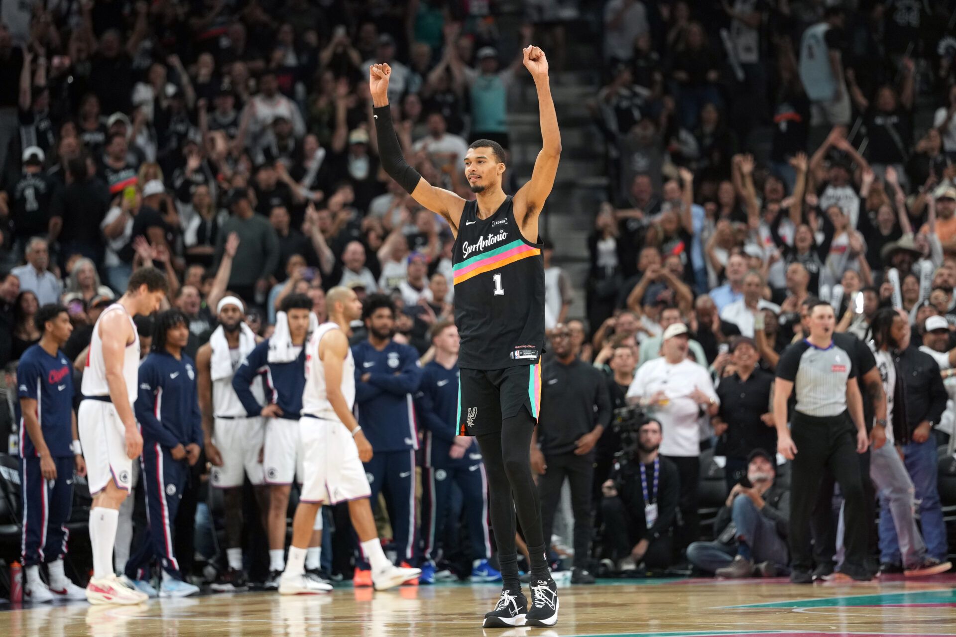 San Antonio Spurs forward Victor Wembanyama (1) reacts after securing a comeback victory over the Los Angeles Clippers at Frost Bank Center.