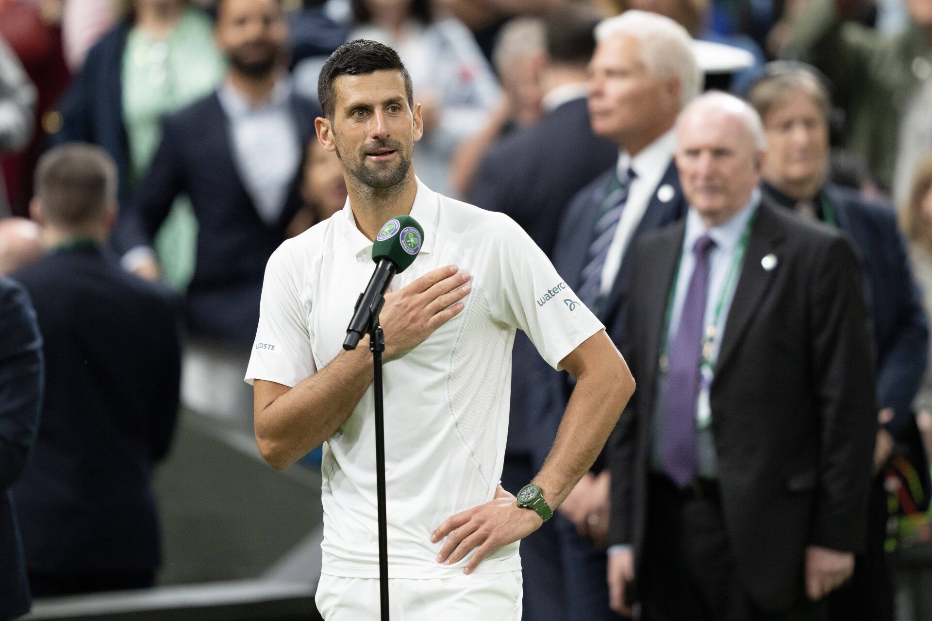 Novak Djokovic of Serbia at his on court interview after winning his match against Holger Rune of Denmark (not shown) on day eight of The Championships at All England Lawn Tennis and Croquet Club.