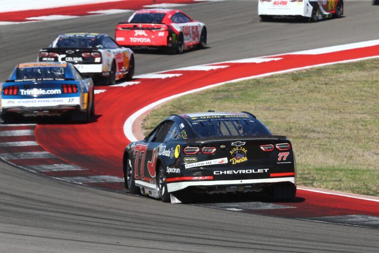 NASCAR Cup Series driver Carson Hocevar (77) enters turn 2 during the NASCAR Cup Series Duramax Texas Grand Prix Powered by RelaDyne at Circuit of the Americas.