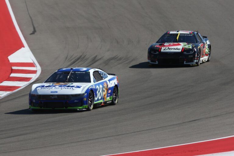 NASCAR Cup Series driver Zane Smith (38) leads NASCAR Cup Series driver Carson Hocevar (77) into turn 1 during the NASCAR Cup Series Duramax Texas Grand Prix Powered by RelaDyne at Circuit of the Americas.