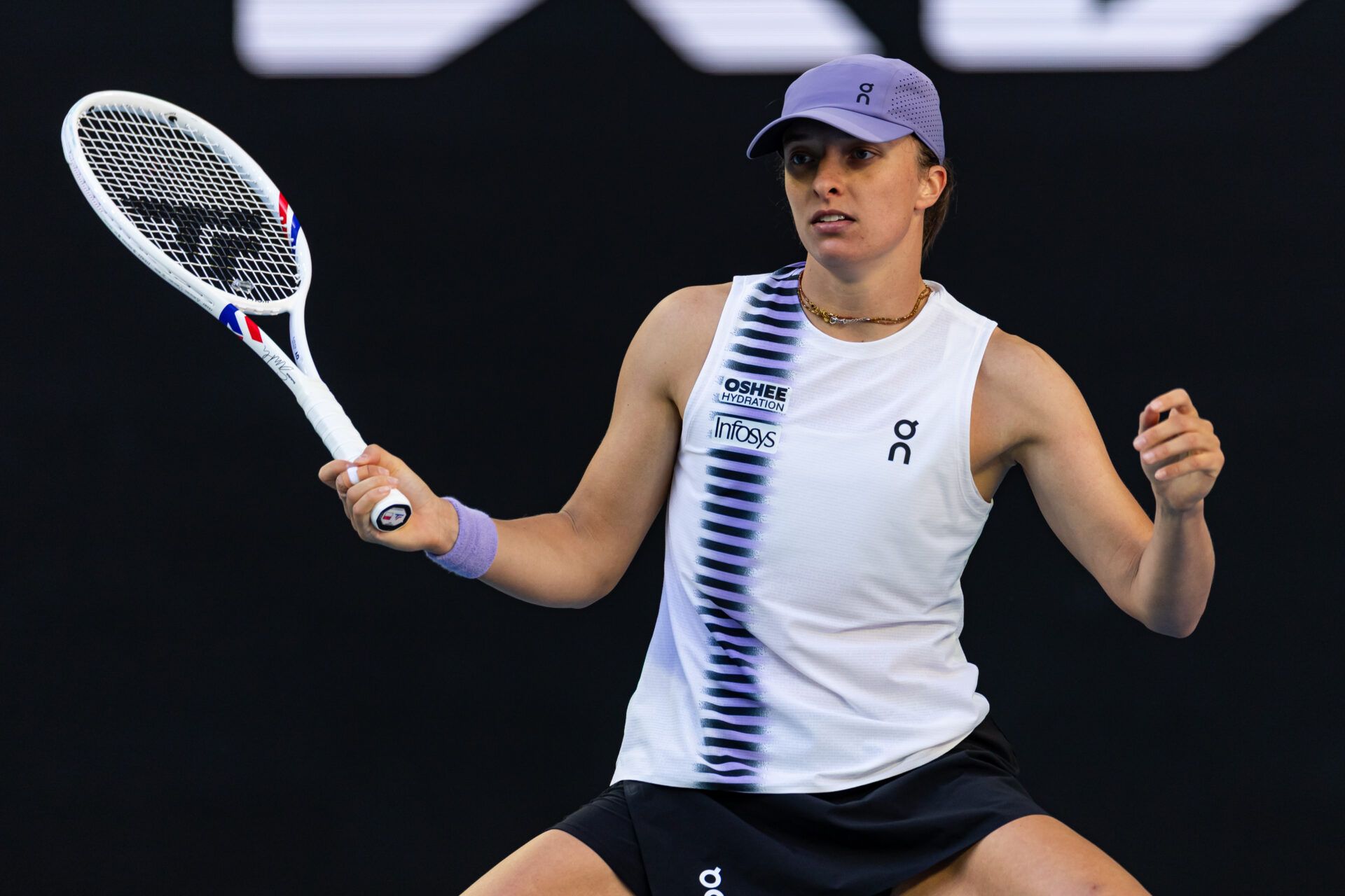 Iga Swiatek of Poland in action against Marie Bouzkova of Czech Republic in the second round of the womens singles at the Australian Open at John Cain Arena in Melbourne Park.