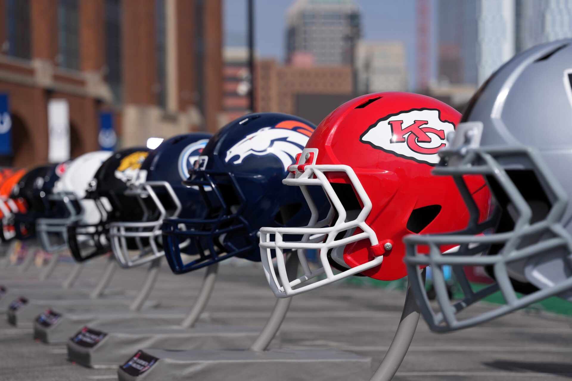 Large helmets of the Las Kansas City Chiefs and Denver Broncos at the NFL Scouting Combine  at Lucas Oil Stadium.