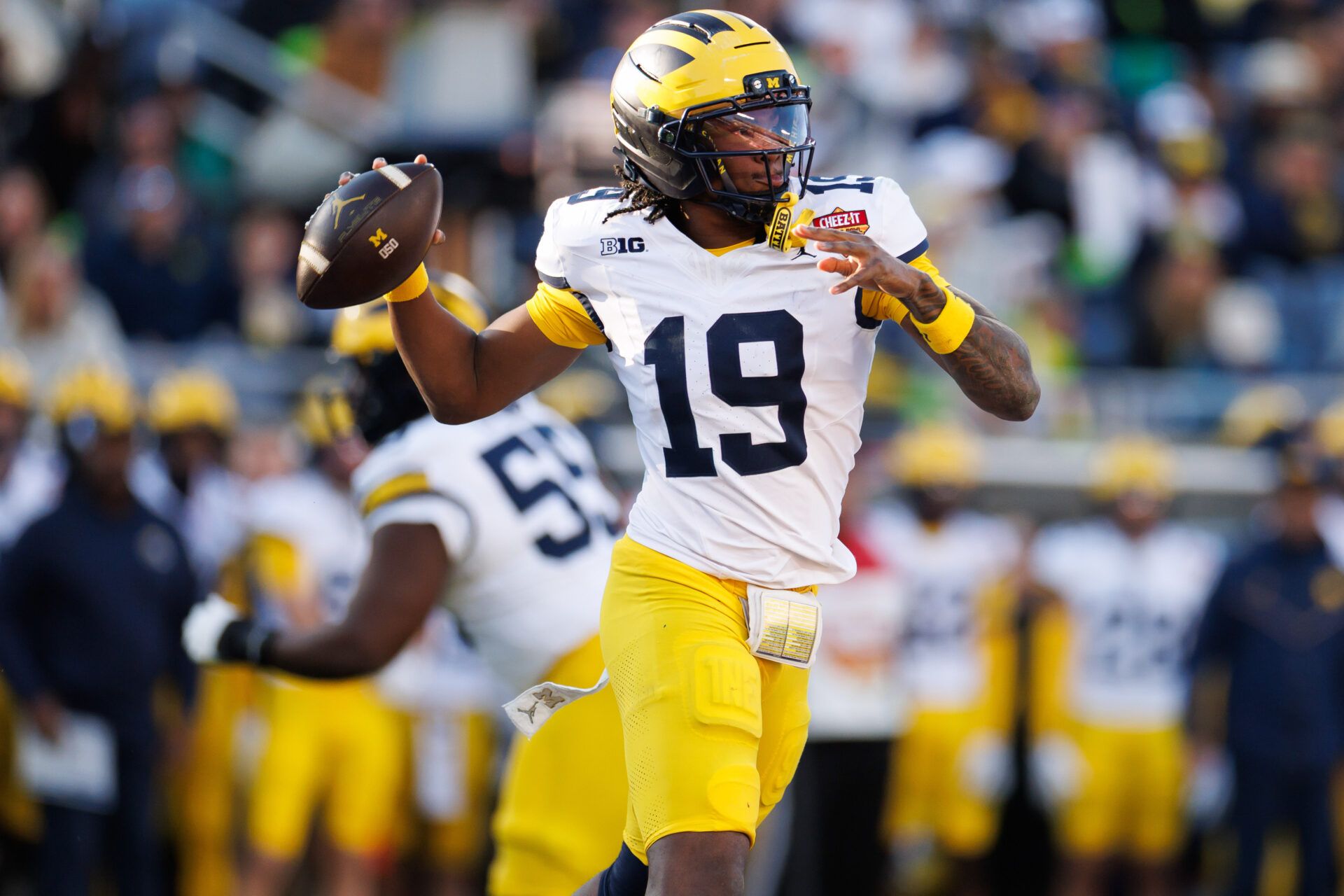 Michigan Wolverines quarterback Bryce Underwood (19) throws the ball against the Texas Longhorns during the second half at Camping World Stadium.