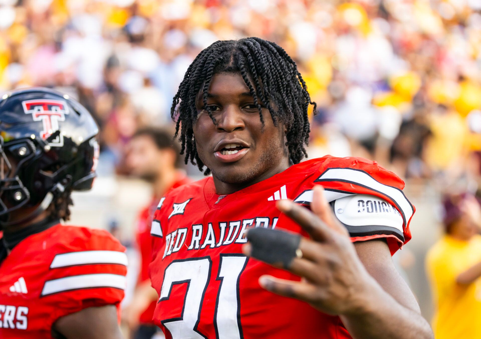 Texas Tech Red Raiders linebacker David Bailey (31) reacts as he walks off the field following the game against the Arizona State Sun Devils at Mountain America Stadium.