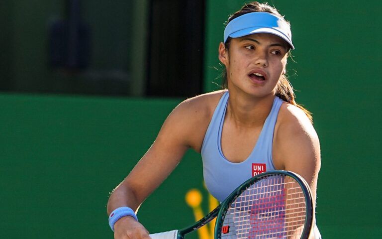 Emma Raducanu gets set to serve to Amanda Anisimova during their third-round match at the BNP Paribas Open in Indian Wells, Calif., Sunday, March 8, 2026.