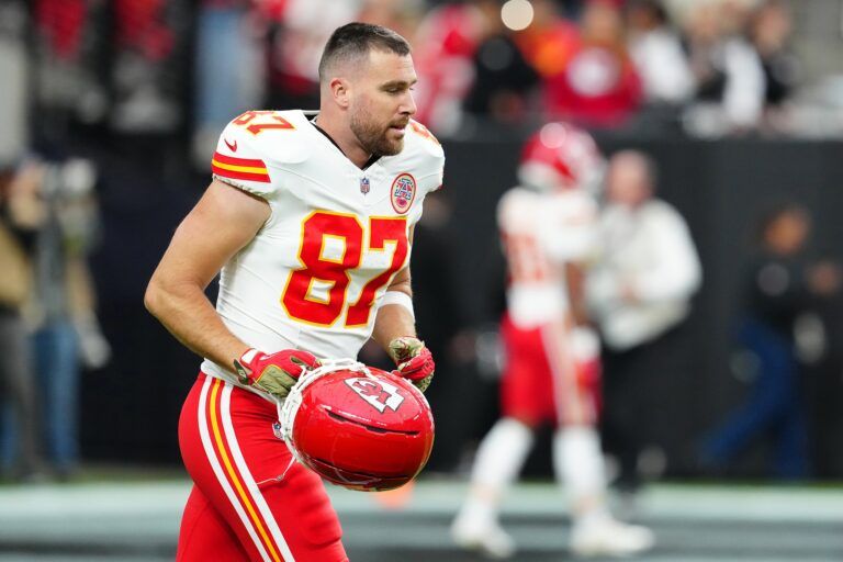Kansas City Chiefs tight end Travis Kelce (87) warms up before a game against the Las Vegas Raiders at Allegiant Stadium.