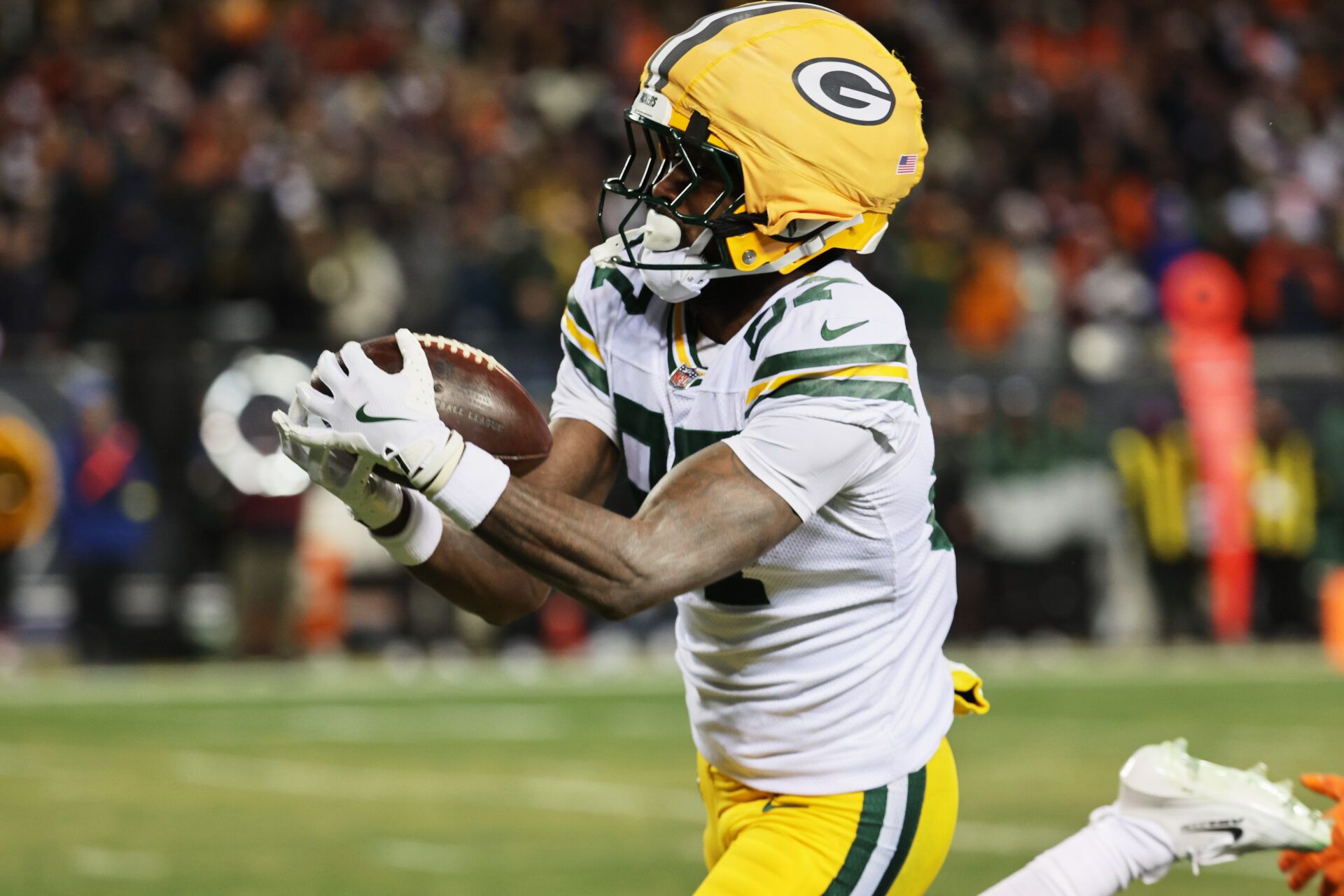 Green Bay Packers wide receiver Romeo Doubs (87) catches a thirty-three yard touchdown pass thrown by quarterback Malik Willis (not pictured) against the Chicago Bears during the third quarter at Soldier Field.