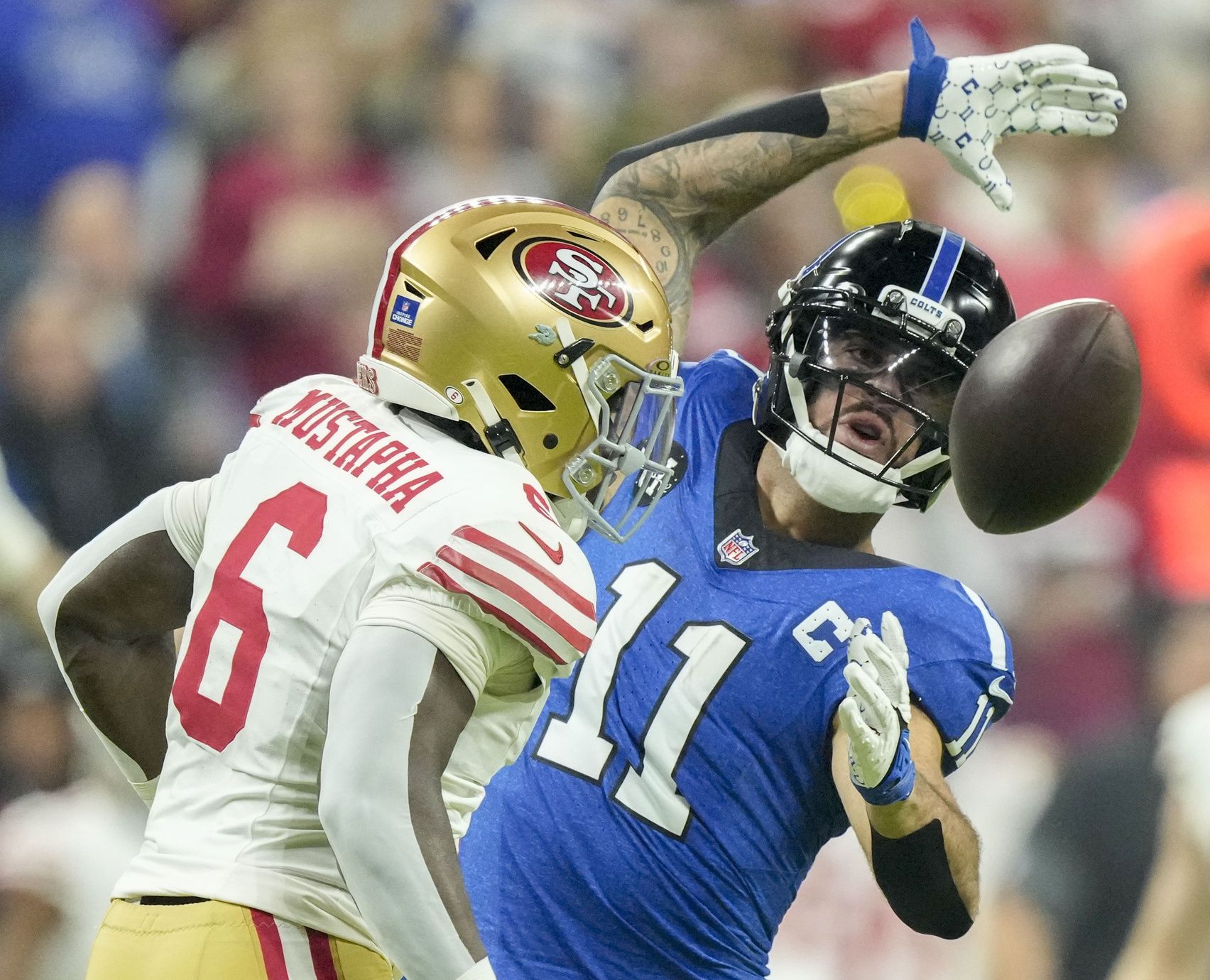 San Francisco 49ers safety Malik Mustapha (6) provides pressure as a pass intended for Indianapolis Colts wide receiver Michael Pittman Jr. (11) falls incomplete during the first half at Lucas Oil Stadium.