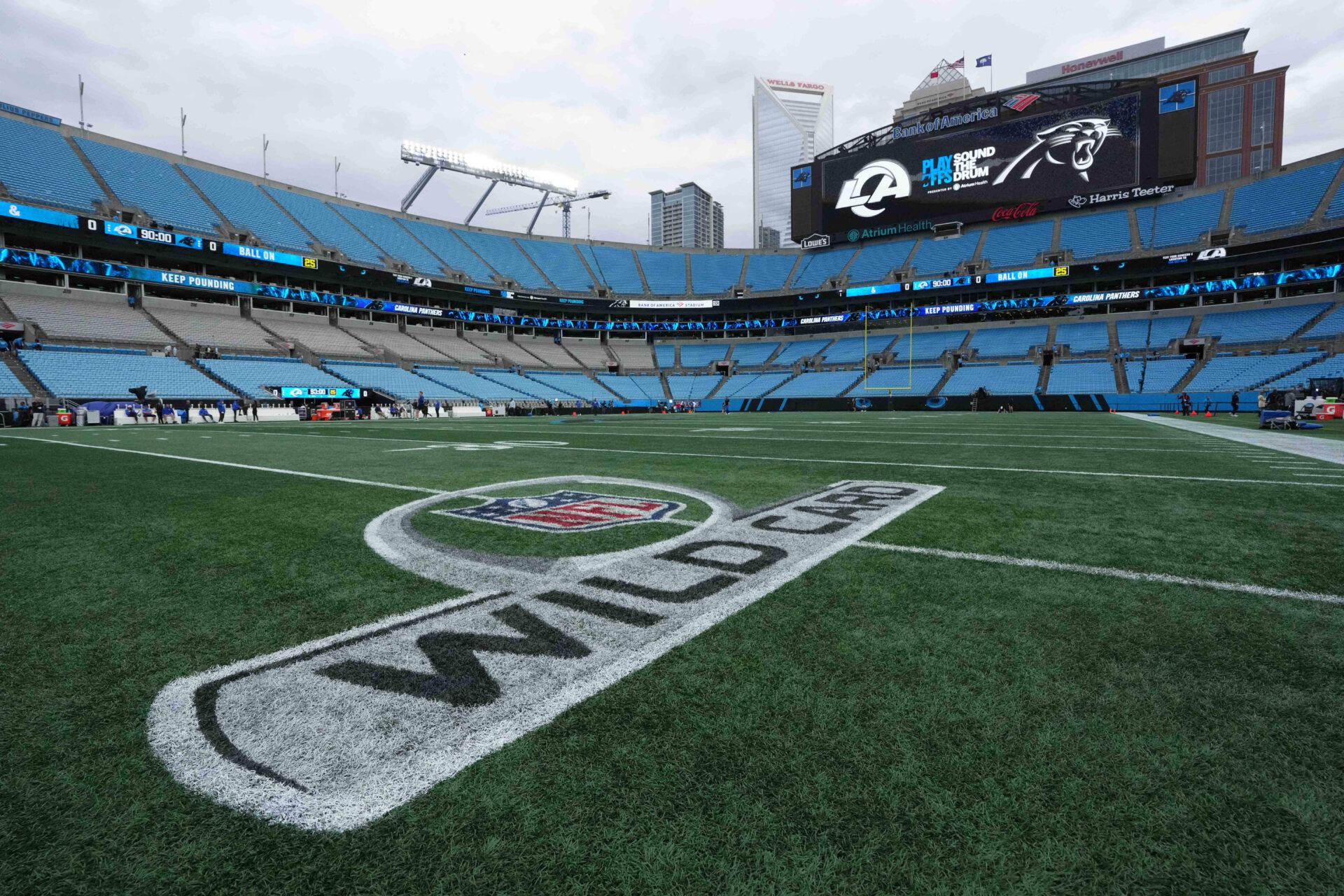 The NFL Wild Card logo on the field prior to the 2026 NFC wild card playoff football game between the Los Angeles Rams and the Carolina Panthers at Bank of America Stadium.