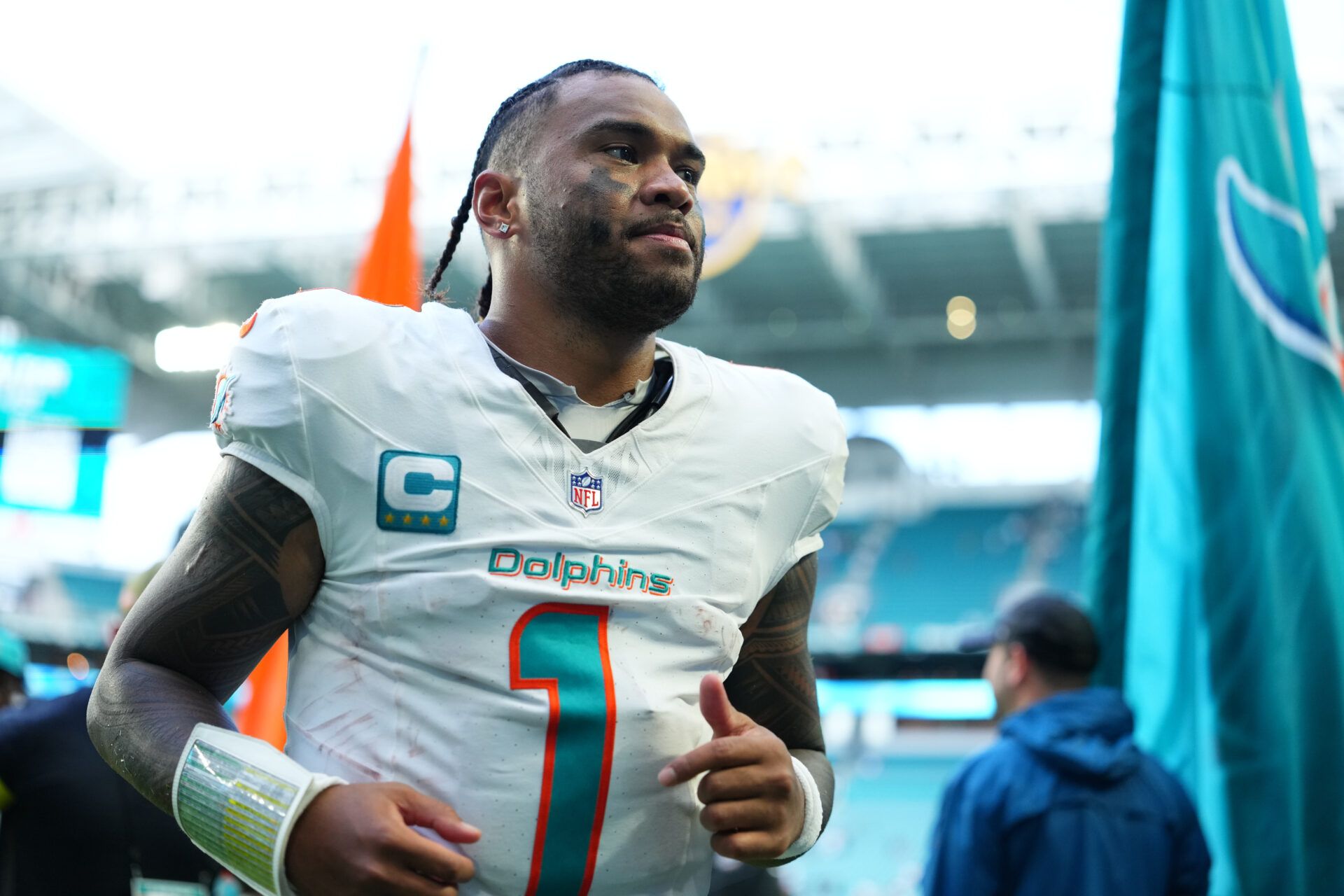 Miami Dolphins quarterback Tua Tagovailoa (1) leaves the field following a game against the New Orleans Saints at Hard Rock Stadium.
