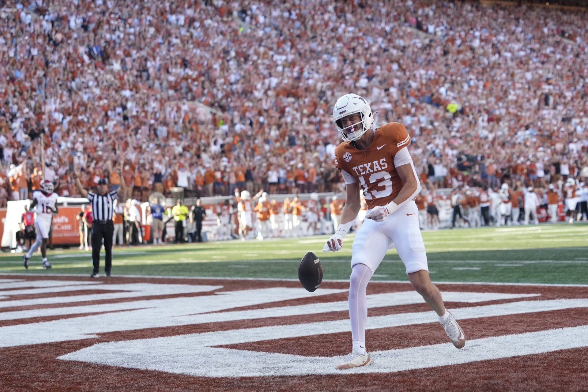 Texas Longhorns wide receiver Parker Livingstone (13) reacts after scoring a touchdown during the first half against the Arkansas Razorbacks at Darrell K Royal-Texas Memorial Stadium.