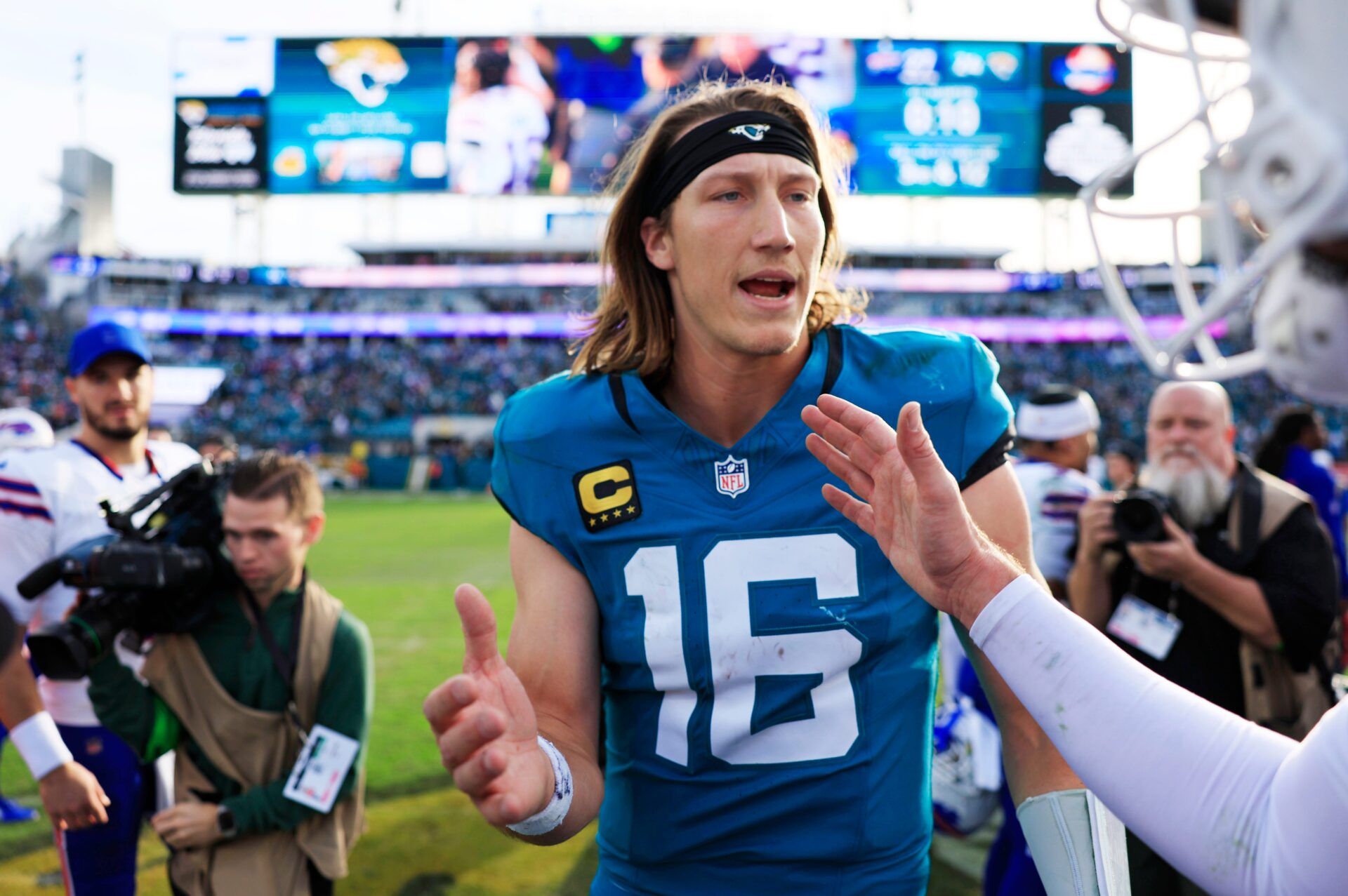 Jacksonville Jaguars quarterback Trevor Lawrence (16) greets Buffalo Bills quarterback Josh Allen (17) after the game of an NFL football AFC Wild Card playoff matchup, Sunday, Jan. 11, 2026, in Jacksonville, Fla. The Bills defeated the Jaguars 27-24. © Corey Perrine/Florida Times-Union / USA TODAY NETWORK via Imagn Images