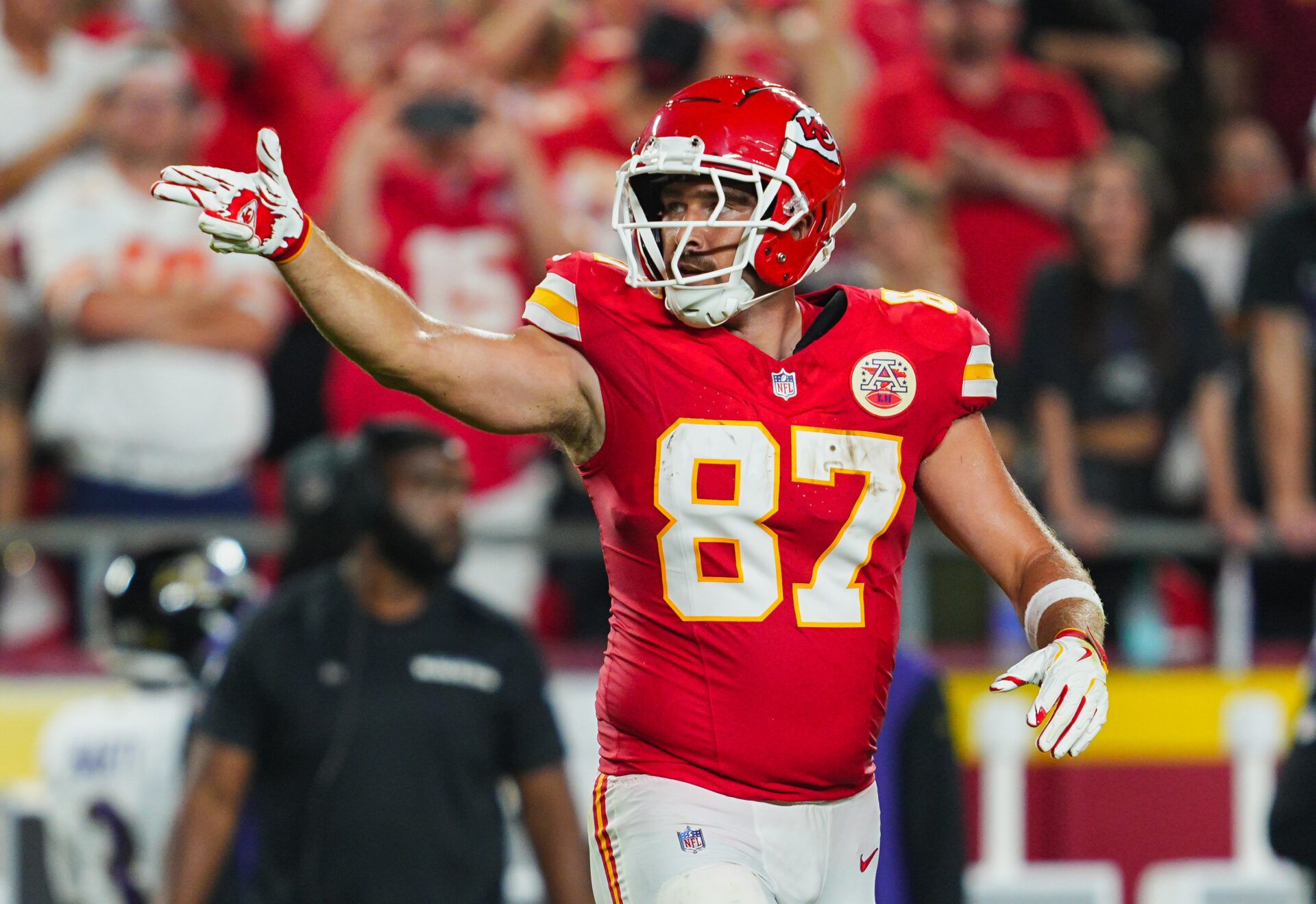 Kansas City Chiefs tight end Travis Kelce (87) reacts after a first down during the first half against the Baltimore Ravens at GEHA Field at Arrowhead Stadium.