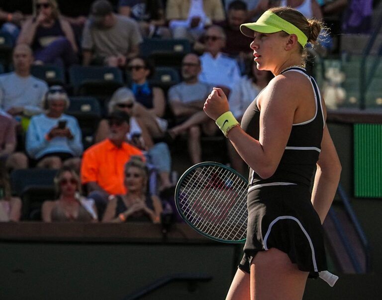 Amanda Anisimova celebrates a point over Emma Raducanu in their third-round match at the BNP Paribas Open in Indian Wells, Calif., Sunday, March 8, 2026.