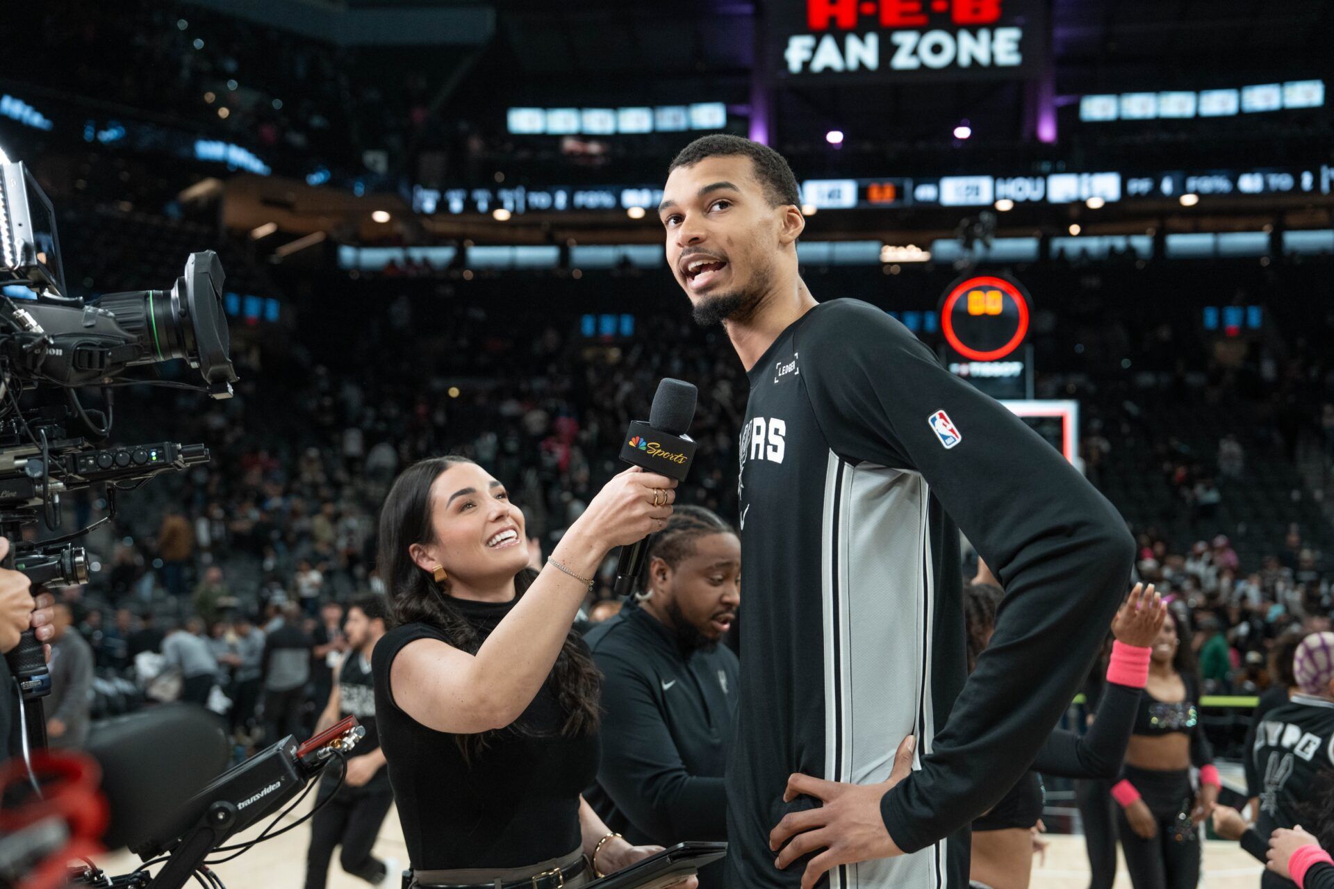 San Antonio Spurs forward Victor Wembanyama (1) gives an interview after the game against the Houston Rockets at Frost Bank Center.