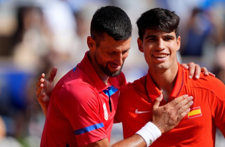 Novak Djokovic (SRB) greets Carlos Alcaraz (ESP) after winning the men’s singles gold medal match during the Paris 2024 Olympic Summer Games at Stade Roland Garros.