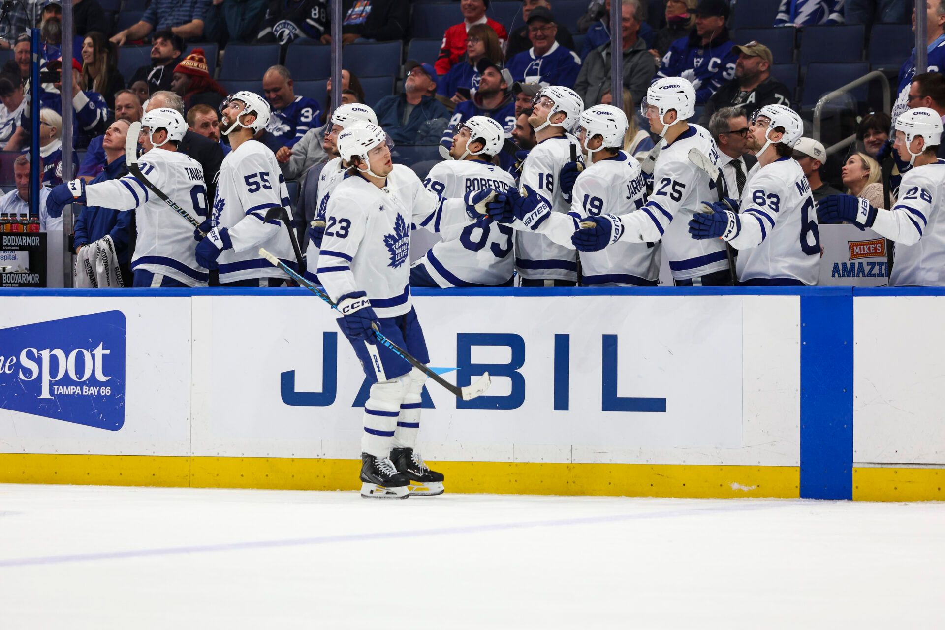 Toronto Maple Leafs forward Matthew Knies (23) celebrates his goal with the bench against the Tampa Bay Lightning during the third period at Benchmark International Arena.