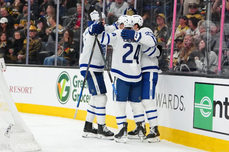 Toronto Maple Leafs center Scott Laughton (24) celebrates with team mates after scoring a goal against the Vegas Golden Knights during the third period at T-Mobile Arena.