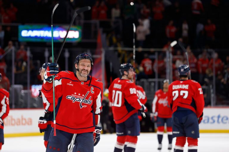 Washington Capitals left wing Alex Ovechkin (8) waves after the Capitals' game against the Calgary Flames at Capital One Arena.