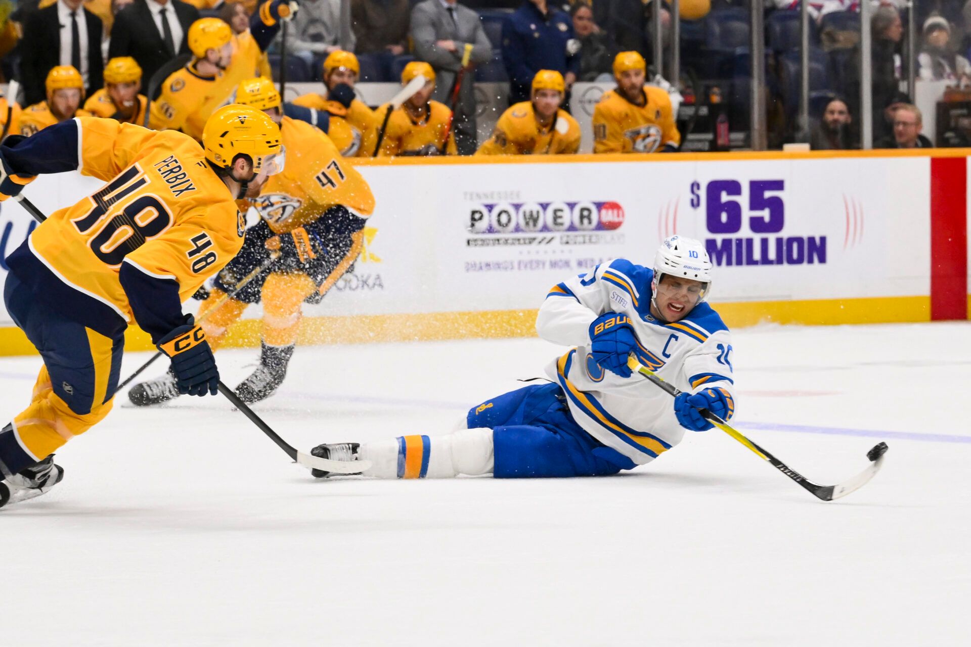 St. Louis Blues center Brayden Schenn (10) flips the puck against the St. Louis Blues during the third period at Bridgestone Arena.
