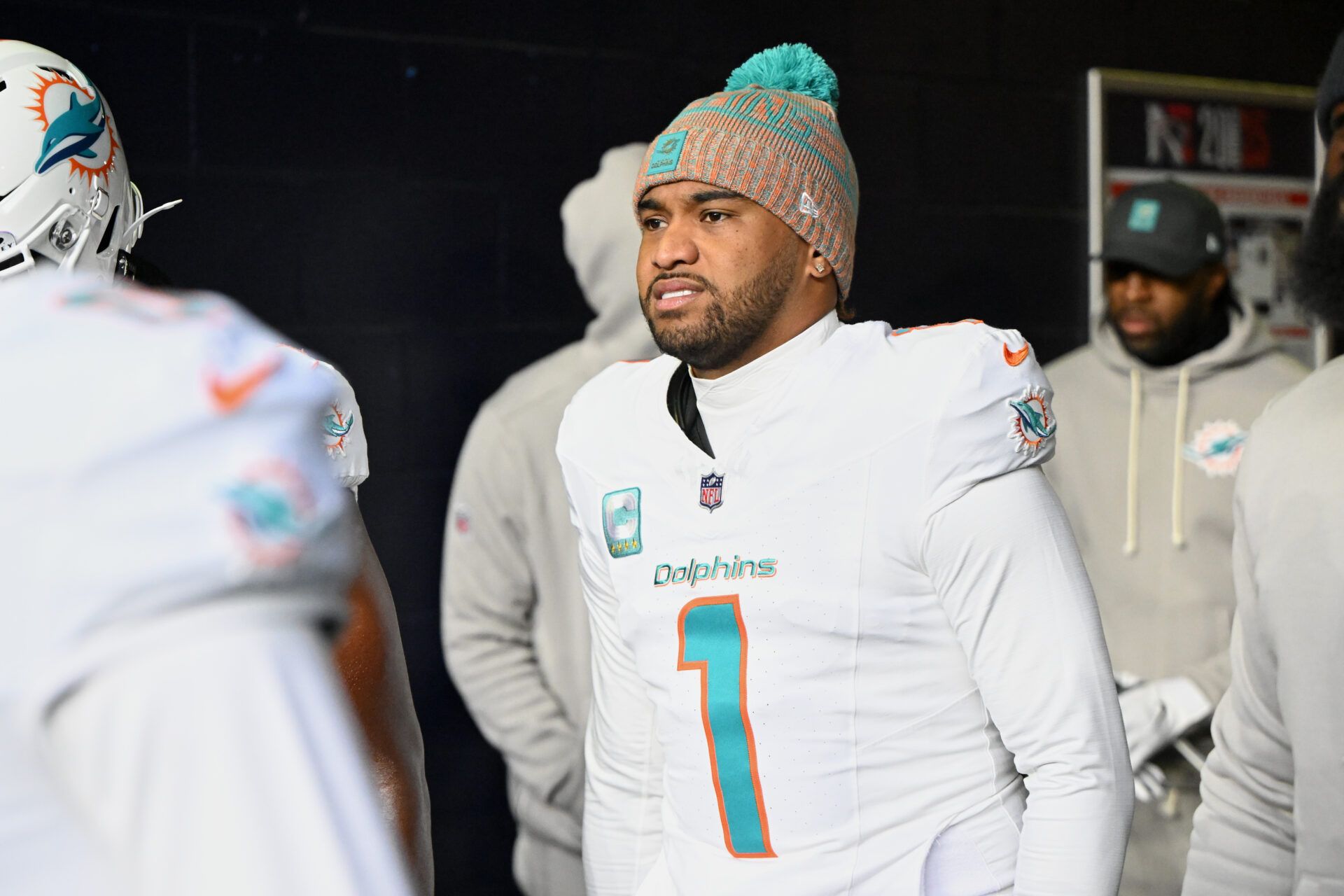 Miami Dolphins quarterback Tua Tagovailoa (1) walks out of the player tunnel before the game against the New England Patriots at Gillette Stadium.