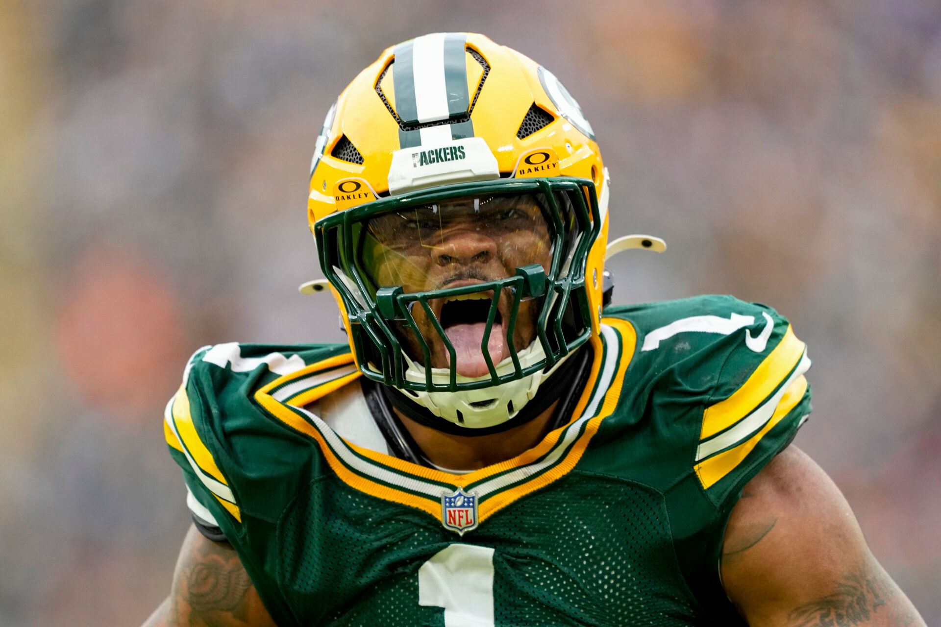 Green Bay Packers defensive end Micah Parsons (1) celebrates after sacking Minnesota Vikings quarterback J.J. McCarthy (9) (not pictured) during the game at Lambeau Field.