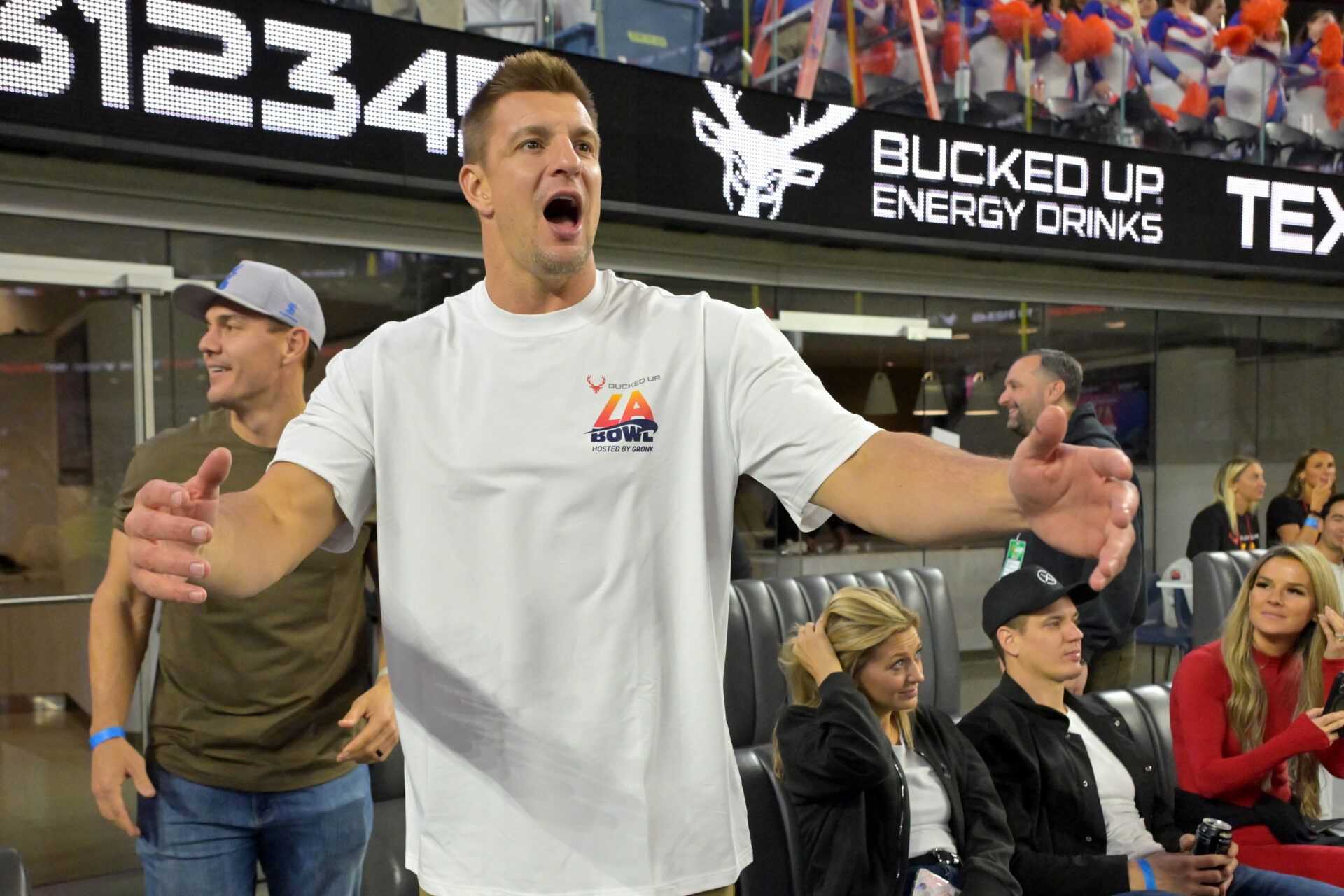 Rob Gronkowski watches the LA bowl between the Boise State Broncos and the Washington Huskies at SoFi Stadium.