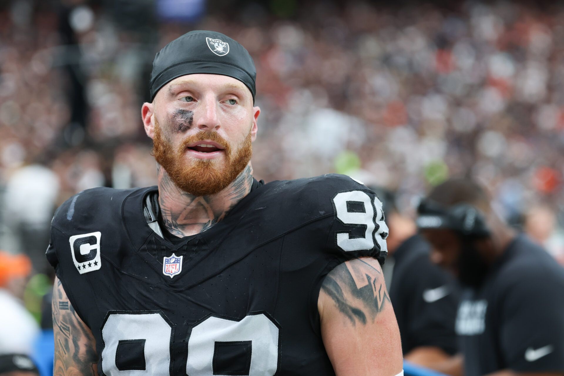 Las Vegas Raiders defensive end Maxx Crosby (98) looks on from the sideline during the first quarter against the Chicago Bears at Allegiant Stadium.