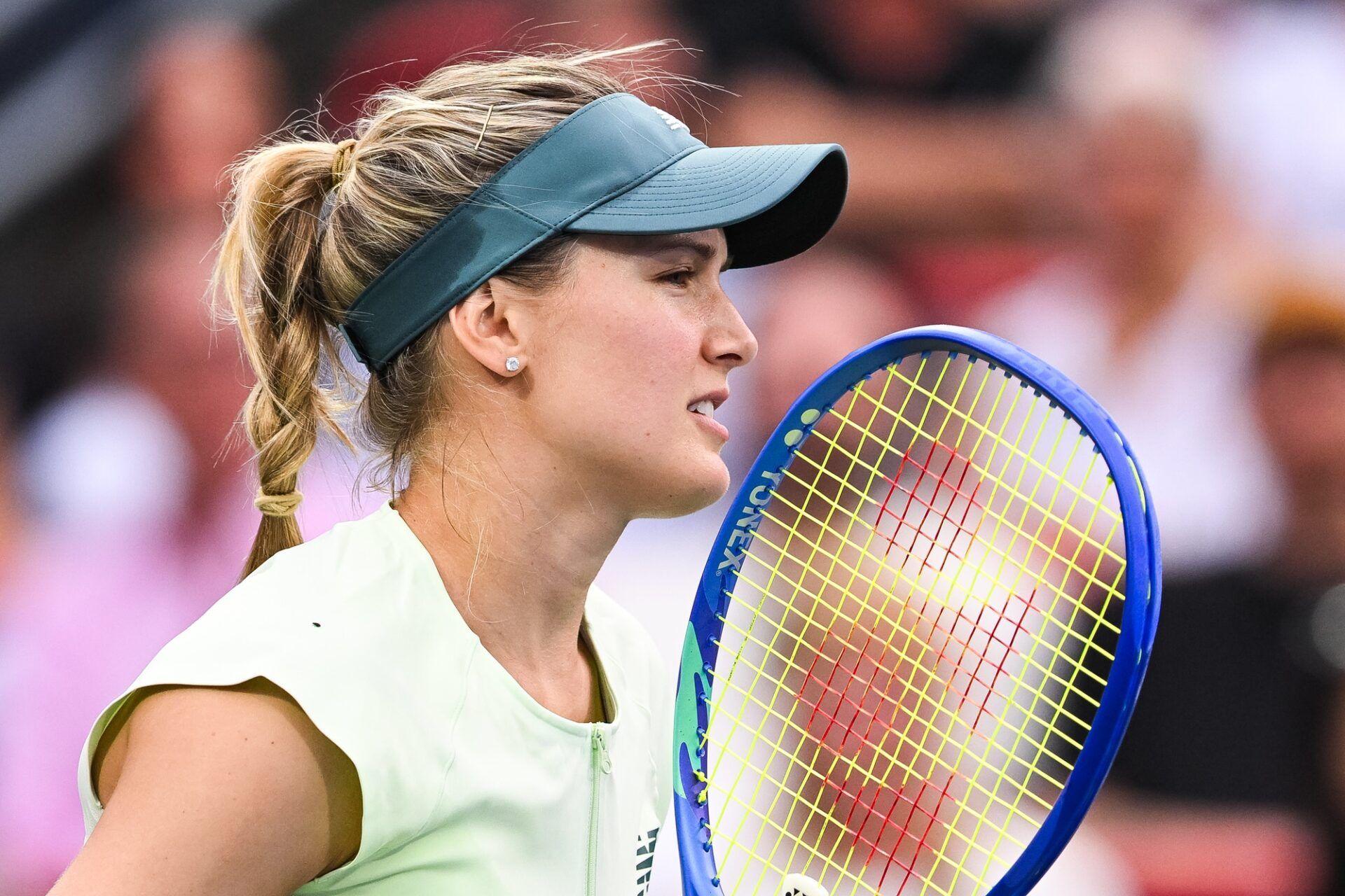 Eugenie Bouchard (CAN) waits for Belinda Bencic (SUI) to serve the ball in second round play at IGA Stadium.