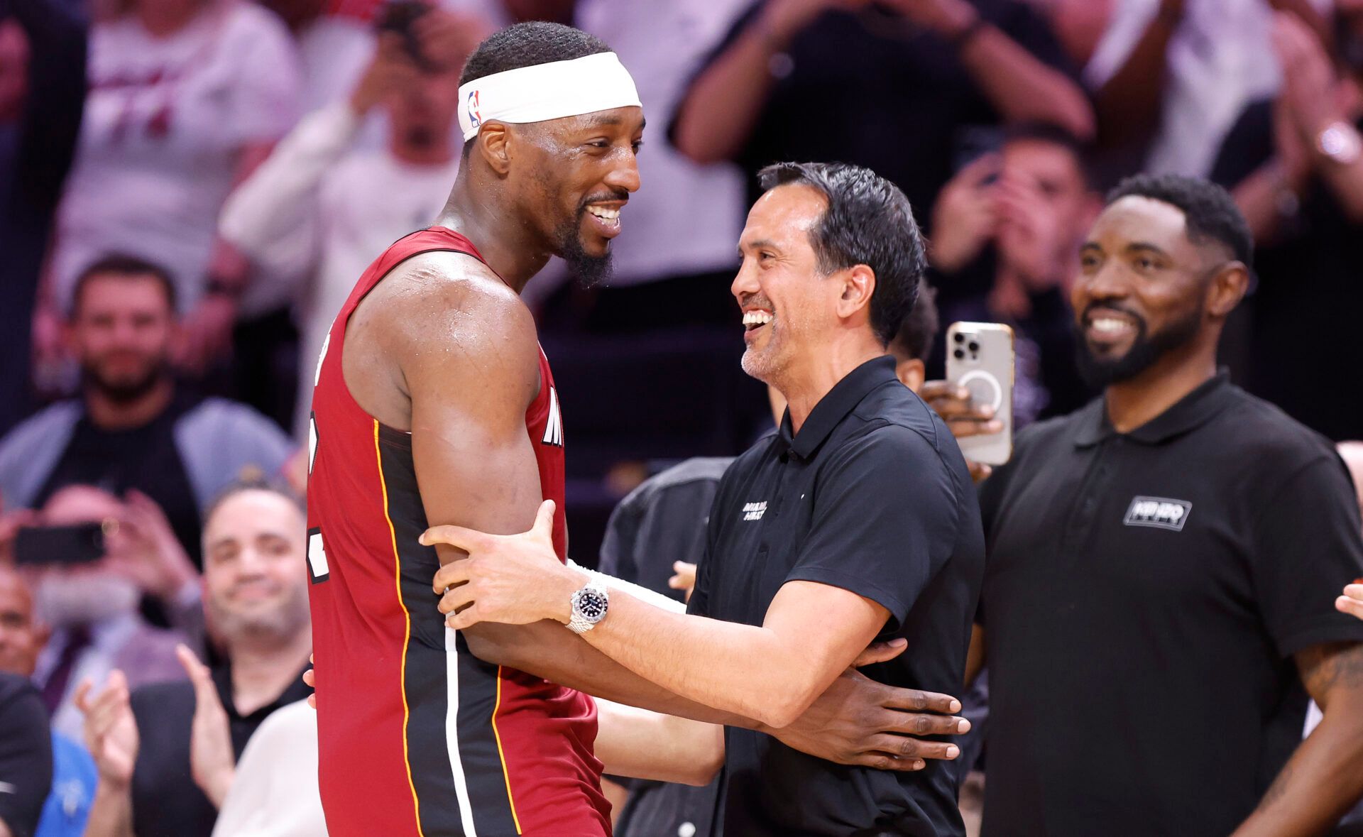 Miami Heat center Bam Adebayo (13) celebrates with head coach Erik Spoelstra after becoming the NBA's second highest scorer of points in a game with 83 against the Wshington Wizards at Kaseya Center.